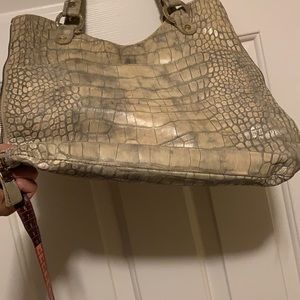 Tan leather bag with magnetic closure